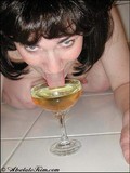 Kinky female with big ass pissing into the glass and drinking the yellow liquor
