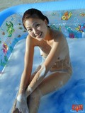 small-titty-asian-filly-exposes-her-tight-soaped-body-outdoors-in-the-kiddie-pool