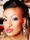 Pierced ethnic fetish babe takes off her blue clothes and shows her naughty bits