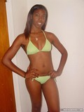 Slim dark skinned amateur chick poses in yellow bikini and black lingerie
