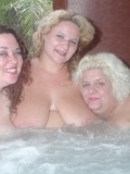 Three chubby mature women show and lick each others fat breasts in sauna