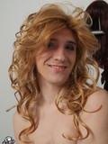 captivating-process-of-a-kinky-crossdresser-making-up-putting-a-wig-on-and-getting-dressed