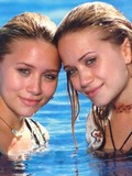 Innocent looking Olsen Twins with beautiful eyes pose in sexy revealing clothes