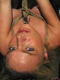 Lez slave gets her pussy tortured and fucked in suspension after spanking