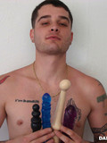 Naked horny daddy shows his multiple tattoos and playfully dildos his asshole