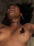 exotic-dark-skinned-slave-lady-gets-tied-spread-eagle-and-tortured-on-the-dungeon-floor