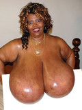 Ebony female has such huge melons that she even can't walk with those monsters