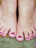 flirtatious-blonde-takes-off-her-clothes-and-leather-boots-then-shows-off-her-sexy-bare-feet