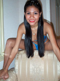 skinny-oriental-girl-in-blue-mini-bikini-spreads-her-slim-legs-wide-open