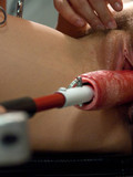 Asian and another lady punish each others pussies and nipples with dildo machine and medical toys