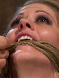 slave-blonde-with-shaved-snatch-and-nicely-shaped-titties-gets-rope-tied