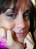 dark-eyed-chick-shows-her-pierced-nipples-tattoos-and-nicely-shaped-ass