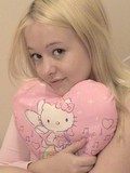 blonde-teen-in-white-and-pink-underwear-shows-her-juicy-melons-and-bald-snatch