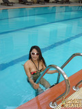 asian-girl-removes-her-bikini-in-the-shower-after-swimming-in-the-pool-and-sunbathing