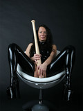dark-angel-dressed-in-black-latex-suit-fucks-her-shaved-loose-cunt-with-big-baseball-bat