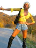 Unable to hitch-hike a car naughty blonde Lily in a wig starts stripping her clothes