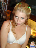 Frisky white teen cutie takes off her white bra and panties flirtatiously