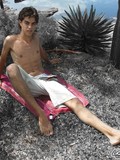 dark-haired-boy-takes-off-his-briefs-and-shows-his-pretty-small-uncut-dick-on-the-wild-beach