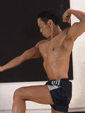 strong-middle-aged-asian-bodybuilder-shows-his-muscles-to-take-your-breath-away