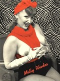 This retro woman in red top looks charming and sexy posing in the armchair