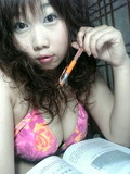 Cute faced asian girls pose in tiny bras and tops showing their sexy cleavages