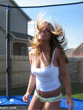 playful-long-haired-kitty-in-sexy-green-panties-jumps-on-and-on-on-outdoor-trampoline