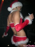 Salacious girl in Christmas outfit performing one of the hottest private dances