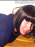 brunette-in-nylons-lifts-up-her-black-dress-and-pulls-down-her-black-panties-for-spanking