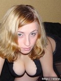 Juicy meloned teen blonde strips down to her boots and shows her young muff