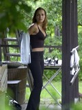 Girl in black bra removes her shirt and unzips her pants in front of hidden camera
