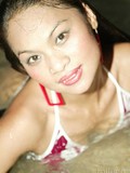 slim-asian-girl-shows-off-her-sexy-tight-body-without-removing-her-bikini-on-the-bank-of-the-sea