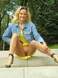 Young blonde girl flashes her tits and pussy in public place by the lake