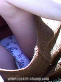 amateur-girls-in-short-skirts-caught-flashing-their-panties-while-having-a-rest-in-the-park