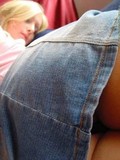 Blonde amateur with small tits and shaved pussy pulls down her skirt and panties